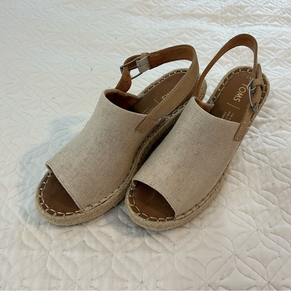TOMS wedge heal sandal in cream.  Excellent condition.  Size 7.